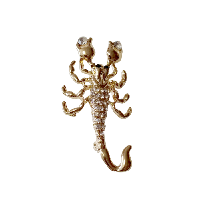 Arany színű skorpió bross kristállyal