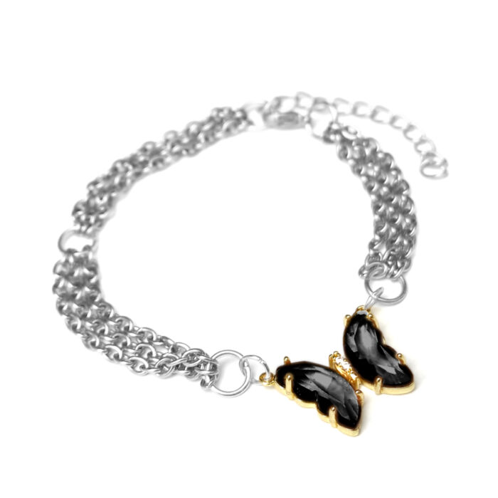 Háromsoros divat karkötő fekete kristálypillangós charmmal, ezüst színű